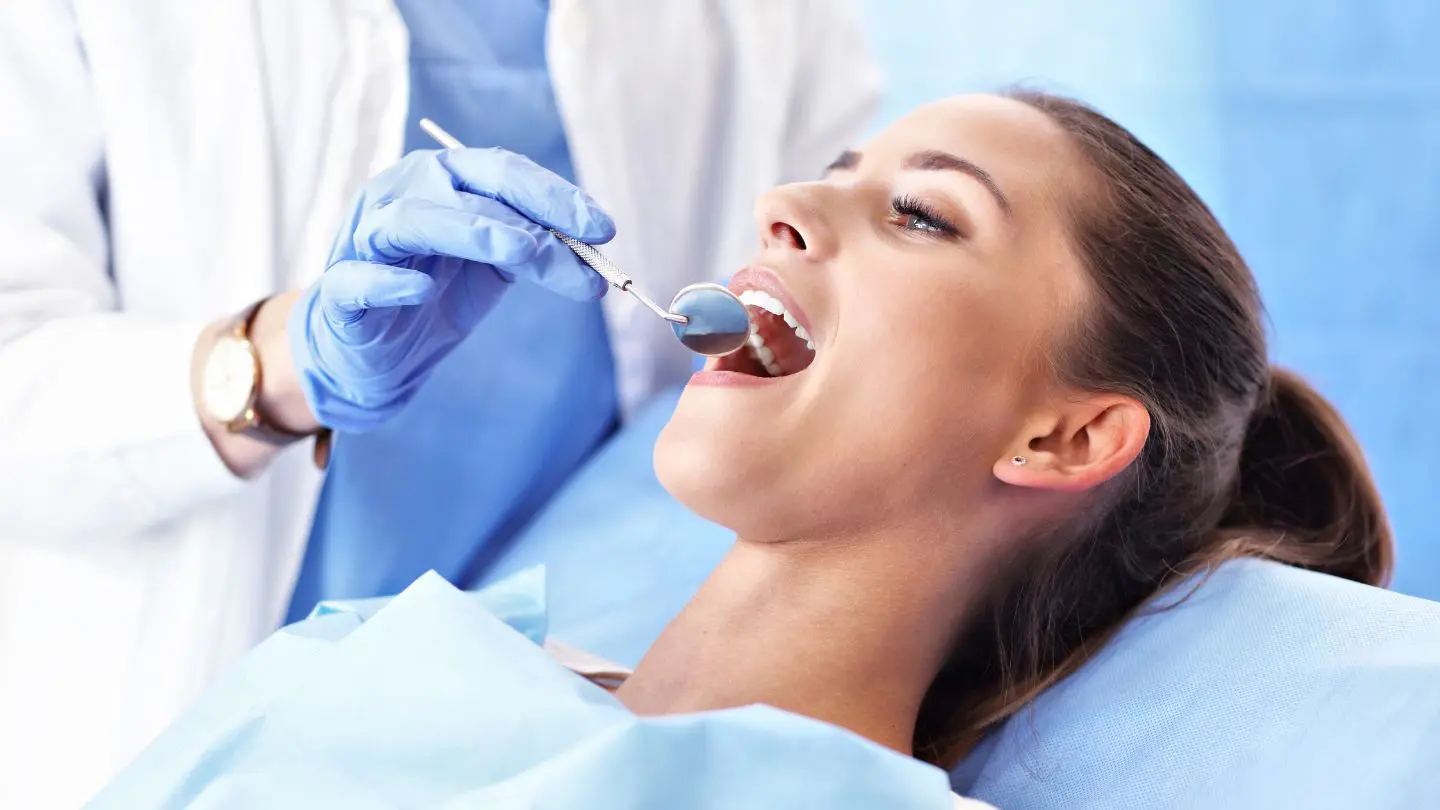 Woman Getting Her Teeth Checked