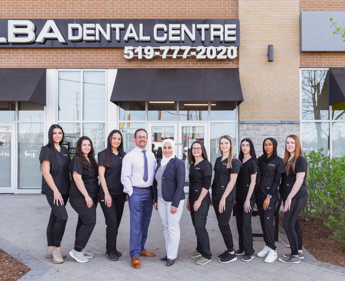 Alba Dental Centre Team Standing Outside Their Office